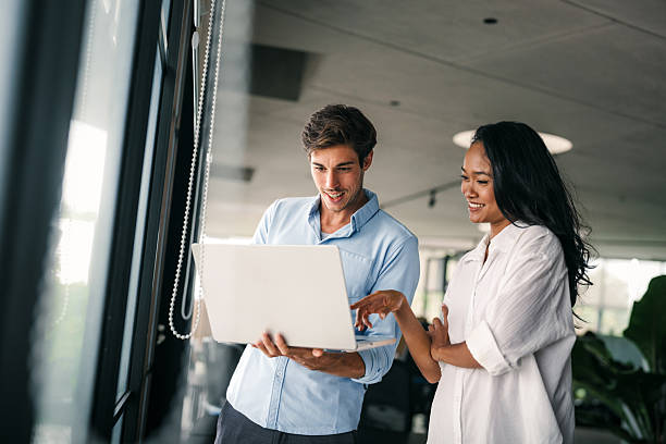 istock Diverse startup, business people working together on laptop computer in modern office 2226823753