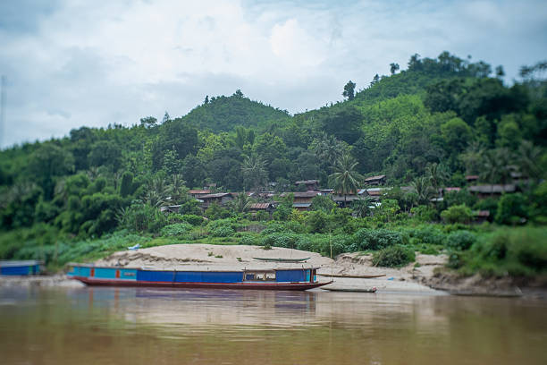 Misty Mountains and Town at Dusk in Laos. High quality photo