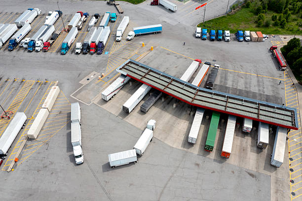 Trucks refueling at a gas station stock photo