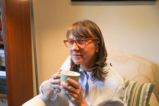 istock Relaxed Woman Enjoying Quiet Moment With Coffee 2226835625