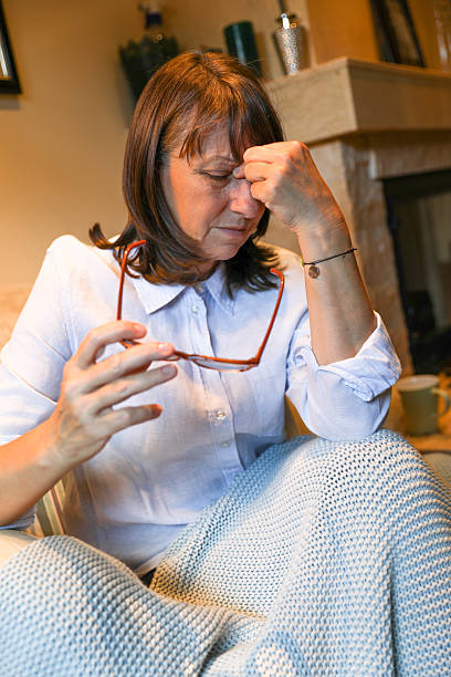 istock Senior Lady Experiencing Discomfort and Tension Indoors 2226835801