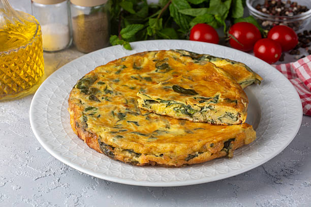 istock Italian omelet; frittata. Eggs with purslane. 2226838703
