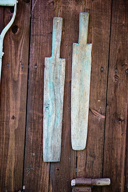 istock Wooden spatulas hanging on a rustic wooden wall in a cozy kitchen setting 2226842818