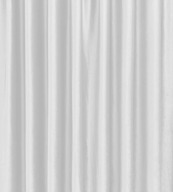istock white satin theater drapes or stage curtains, full frame, evoking elegance, drama, and luxury. Perfect for backgrounds. 2226847540