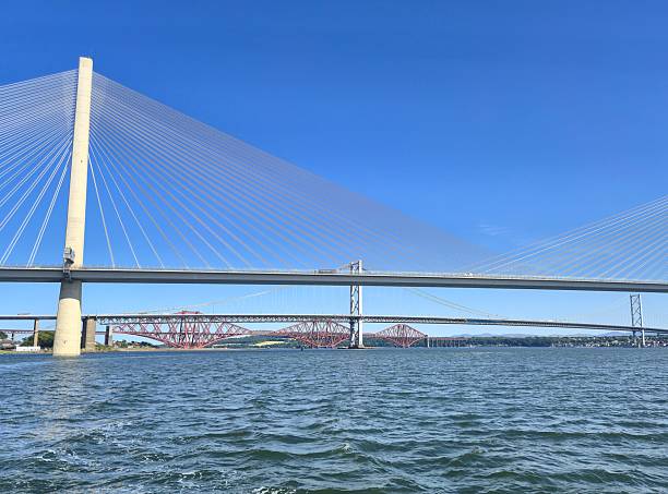 istock Trio of Bridges Spanning River in Scenic Sequence – Cable-Stayed, Suspension and Cantilever Structures Showcasing Architectural Diversity and Connectivity 2226847961