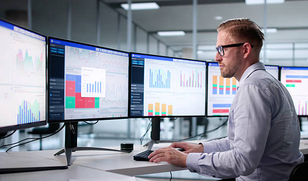 istock Young Man Monitoring Business Analytics On His Computer 2226848917