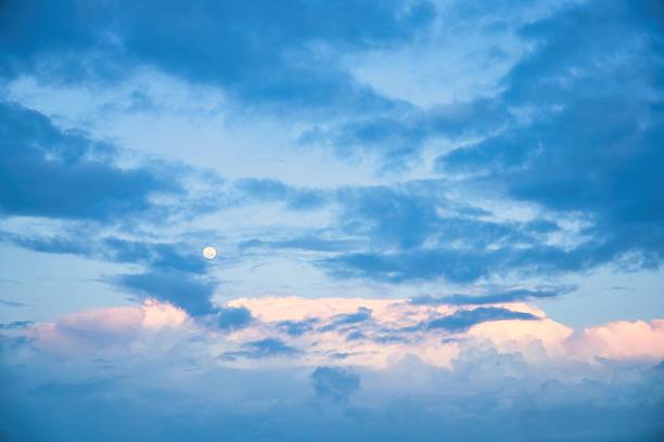 Sky replacement of New Zealand clean blue sky,  clouds and the moon.