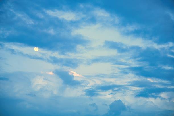 Sky replacement of New Zealand clean blue sky, clouds and the moon.