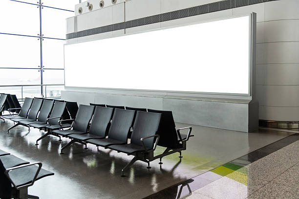 istock Billboard and chairs at airport waiting room 2226852358