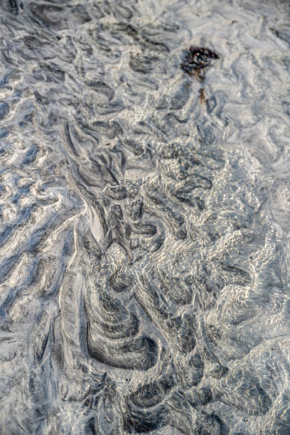 istock Abstract Seabed Textures: Mesmerizing Wavy Sand Patterns Under Clear Shallow Water - Nature's Organic Art 2226852971