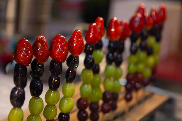 Tanghulu a Sugar Coated Fruit Skewer for sale at a street market