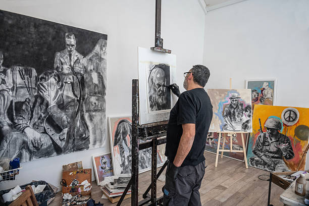Artist in his painting studio, in Villa Giardino, Córdoba, Argentina.
