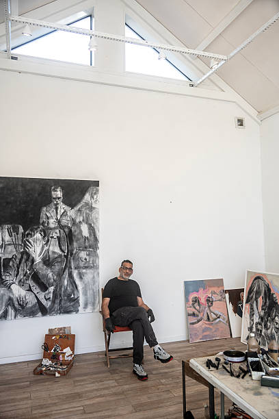 istock Artist in his painting studio. 2226854553