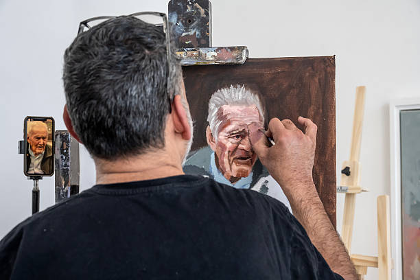 Artist in his painting studio, in Villa Giardino, Córdoba, Argentina.