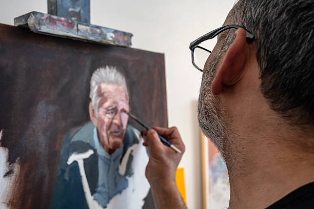Artist in his painting studio, in Villa Giardino, Córdoba, Argentina.