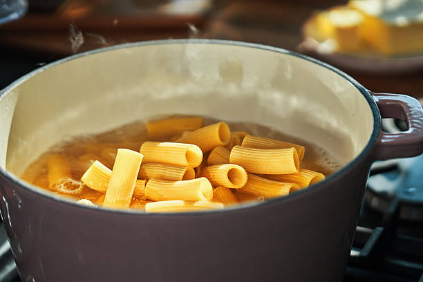 istock Preparing Rigatoni Pasta with Blue Mussels and Mixed Peppers 2226862320