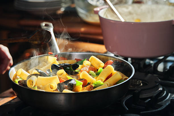 istock Preparing Rigatoni Pasta with Blue Mussels and Mixed Peppers 2226862706