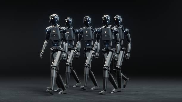 istock Futuristic Visualization of Group of Advanced Humanoid Robots Marching Across Dark Digital Cyberspace 2226866951