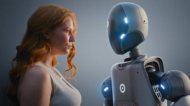 istock Human-Machine Collaboration Concept: Visualization of Young Woman Looking Tenderly at Humanoid Robot 2226867373