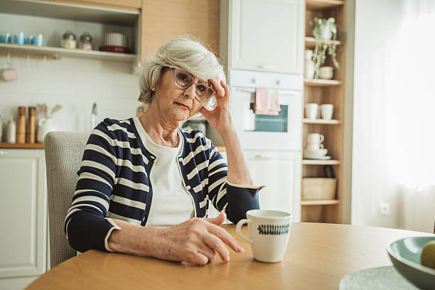 istock Senior woman alone at home 2226872807