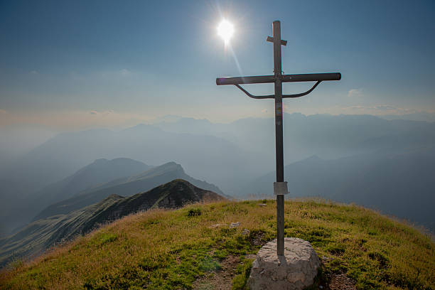 Iron cross on the mountain in memory of those who fell