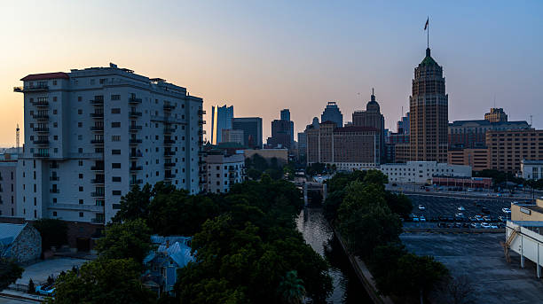 istock River Walk at dusk with San Antonio skyline 2226878422