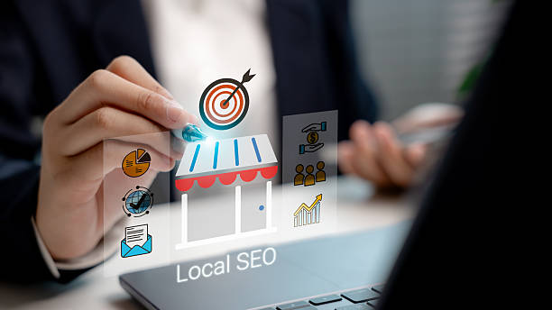 businessman using stylus on virtual interface with local seo icon and storefront graphic. concept of local search optimization, small business marketing, and online visibility. - sökmotor bildbanksfoton och bilder
