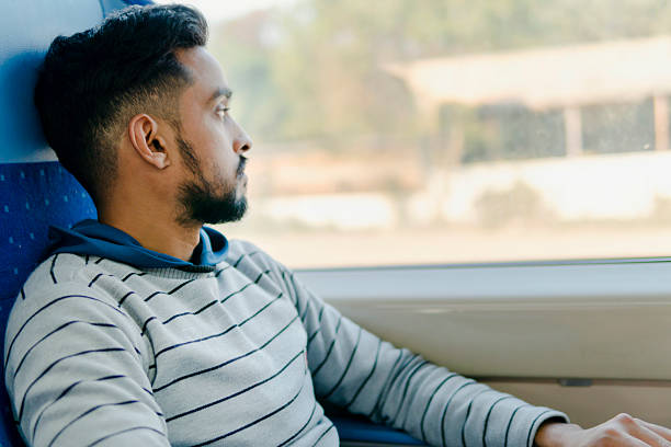 istock indian young man of travelled by train. 2226891905