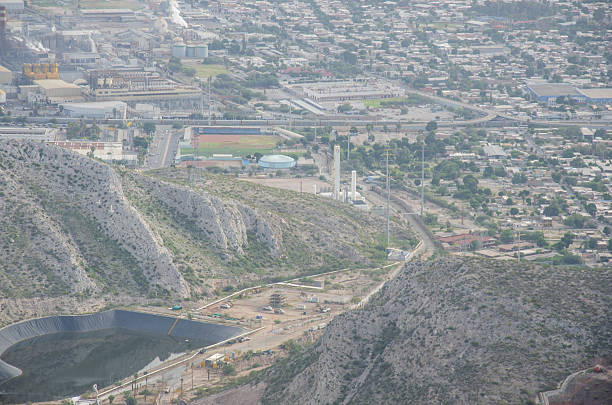 istock Urban sprawl meets rugged terrain in this captivating cityscape panorama view from the mountain peak 2226892959