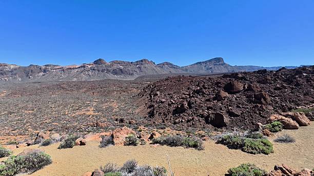 istock Stunning Desert Landscape Featuring Majestic Rocky Mountains and Expansive Terrain 2226893568