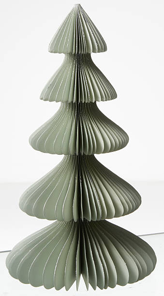 istock Green paper folded Christmas tree isolated nature background with clipping path 2226895722