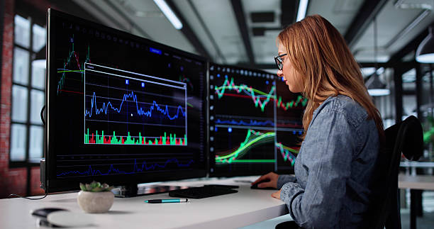 istock Female Stock Broker Analyzing Market Trends 2226897015