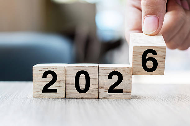 istock hand flipping block 2025 to 2026 text on table. Resolution, strategy, plan, goal, motivation, reboot, business and New Year holiday concepts 2226898052