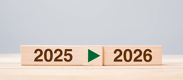 istock 2025 and 2026 wooden block on table background. Resolution, strategy, countdown, goal, change and New Year holiday concepts 2226898134