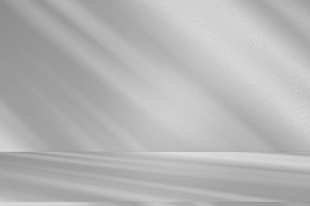 istock Wall interior background, studio and backdrops show products.with shadow from window color white . background for text insertion and presentation product 2226898400