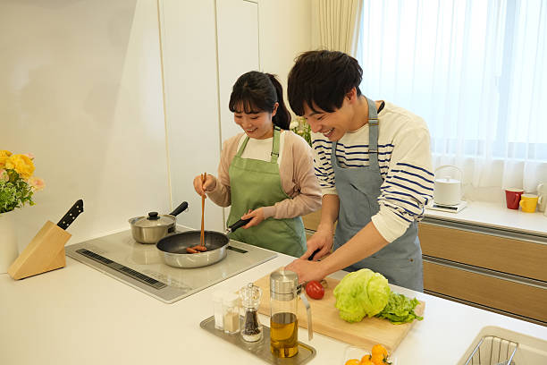 istock Couple cooking together in the kitchen 2226904817