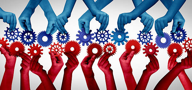 istock Two Business Groups Working Together 2226906395