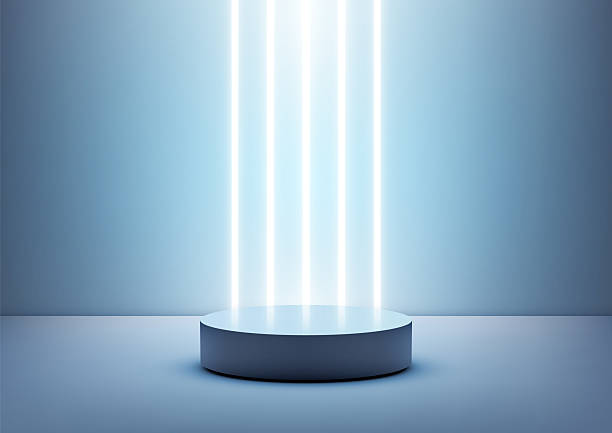 istock technology podium with neon light beams in modern 3d display for product mockup on white cylindrical stage over blue floor in futuristic clean showroom interior scene 2226908125