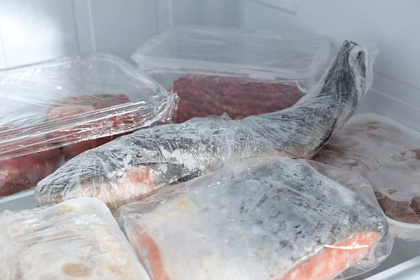 istock Different frozen meat and fish products on refrigerator shelf, closeup 2226910814