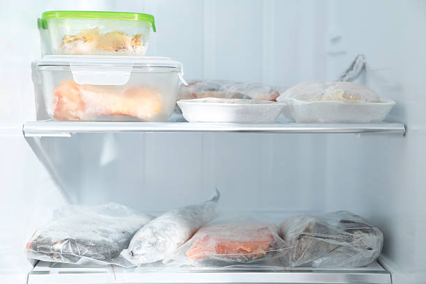 istock Different frozen meat and fish products in fridge 2226910989