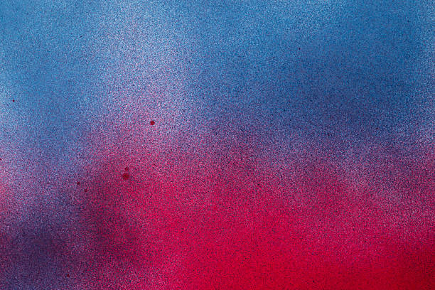 istock Red and blue spray paint background 2226914146