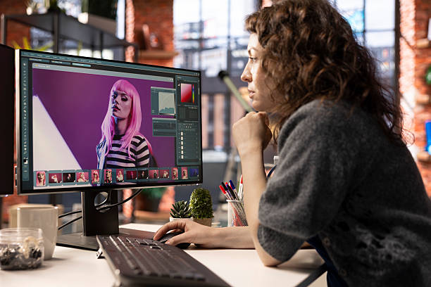 istock Female graphic designer editing photos on a modern computer setup 2226914931