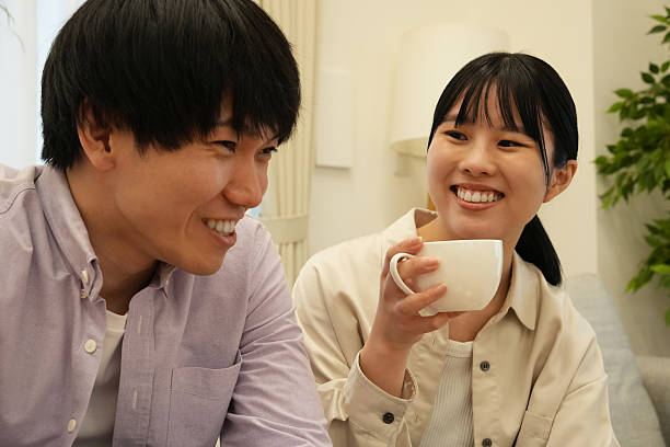 istock A couple relaxing and talking on the sofa 2226920965