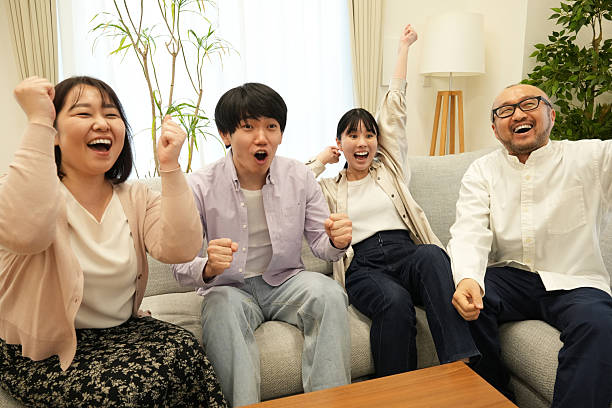 istock Kazou gets excited watching the game at home 2226921150