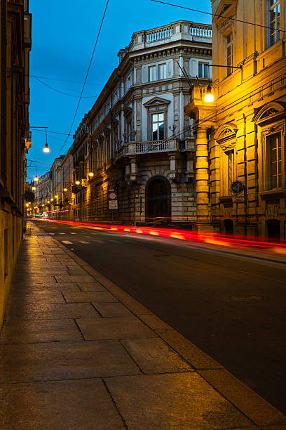 Rome,Italy-Sep.25th 2025: street view of Via Cernaia in Rome at evening, historic buildings and parked vehicles