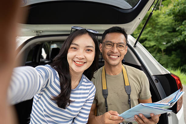 istock Couple enjoying road trip adventure, taking selfies and exploring 2226923135