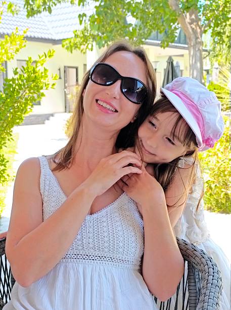 Mother and daughter hug . High quality photo