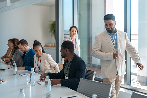 istock Diverse Business Executives Engaged in a Meeting in a Modern Boardroom Setting 2226935501
