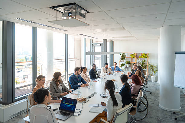 istock Diverse Business Executives Collaborating in a Bright Modern Boardroom with Large Windows 2226936835