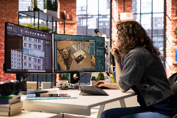 istock Professional architectural designer configures a floor plan on dual monitors 2226937931